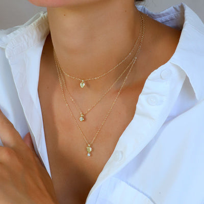 Three Diamond Pendants on Model