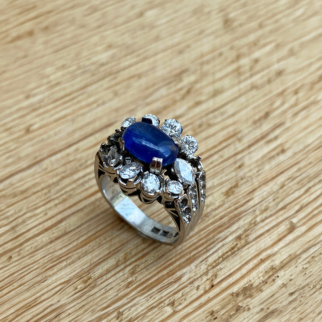 Our client had inherited two diamonds rings. She wanted to create a new ring to wear everyday.