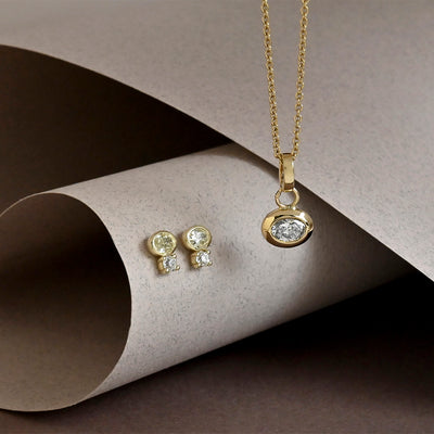 Oval Diamond Pendant and Earrings